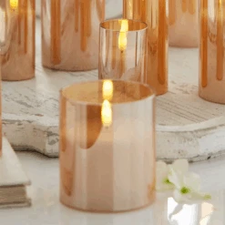 Raz 6" Pillar Battery Operated Flickering Candle In Gold Glass 4 Raz 6" Pillar Battery Operated Flickering Candle In Gold Glass -Christmas Decor Shop 4432937 edit 02921.1717521504